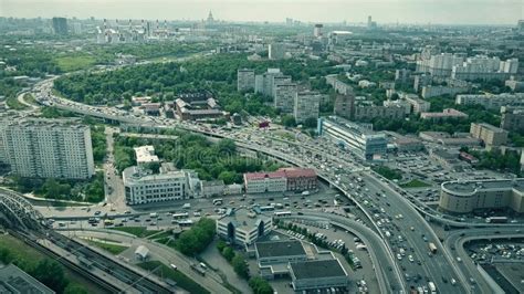 Aerial Shot Of Moscow Cityscape And Congested Road Traffic In The Rush