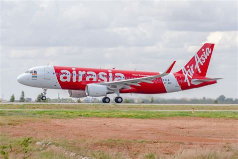 Everything you want to know about airasia. Through the lens: Air Asia India's maiden flight ...