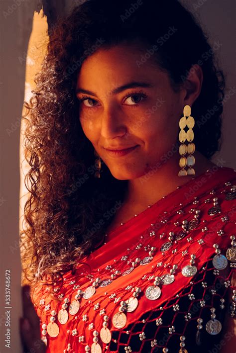 Portrait Of Beautiful Ethnic Arab Woman In Moroccan Hotel Isolated