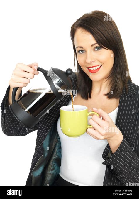 Attractive Business Woman Pouring Coffee Stock Photo Alamy