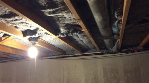 Because concrete transfers moisture, you should never install carpet or wood directly over the bare slab of a basement; Installing Denim Insulation in a Natick MA Basement ...