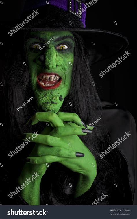 Scary Witch Contemplating Evil Thoughts Low Stock Photo