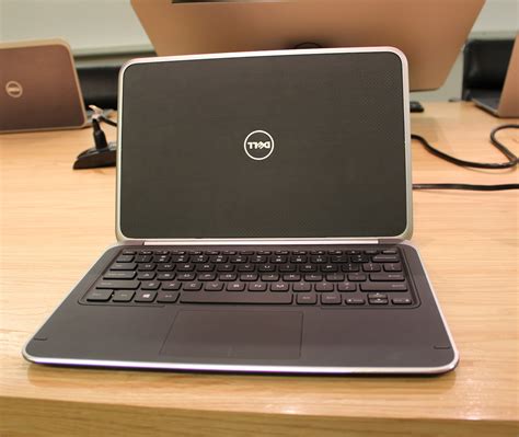 Laptops, desktops, gaming pcs, monitors, workstations & servers. Dell's $1,200 XPS 12 makes it easy to put the top down | Ars Technica