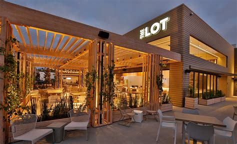A modern outdoor patio is characterized by clean lines and modular forms that are very appealing and now that spring is here, its time for some inspiration. The Lot Restaurant & Cinema - Stellar Interior Design