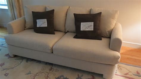If you don't want too much showing over the sofa, get one that is a little lower that is mid sofa(gets harder if. how much does sofa reupholstery cost | Brokeasshome.com