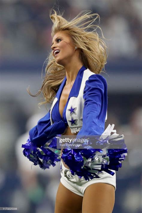 The Dallas Cowboys Cheerleaders Perform As The Cowboys Take On The