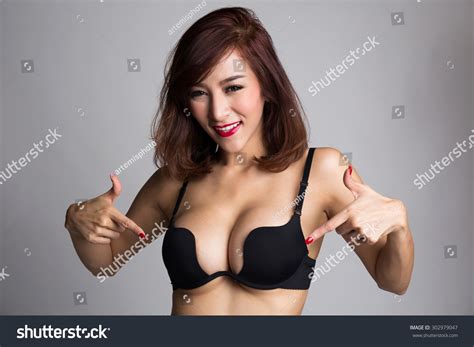 Sexy Asian Woman Showing Pointing Her Ảnh có sẵn chỉnh sửa ngay