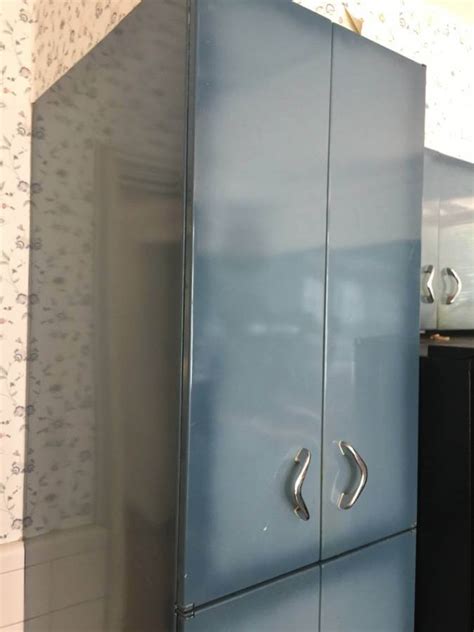 During wwii, rosie the riveter had ramped up steel production significantly in order to produce weaponry. Burnt blue Youngstown steel kitchen cabinets - what a ...