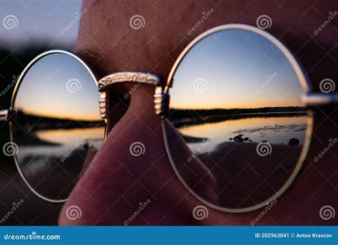 Reflection In The Glasses Of The Coast And Sunset Stock Image Image