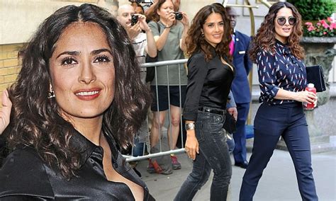 Salma Hayek In A Lipstick Printed Blouse Before Baring Cleavage In Satin Shirt Daily Mail Online