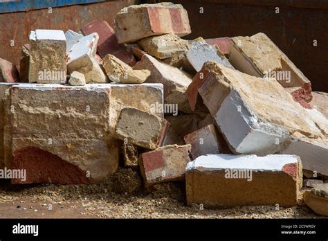 A Pile Of Bricks And Rubble That Has Been Fly Tipped From A Broken