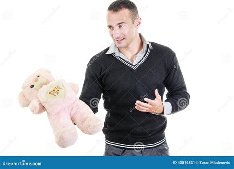 Young Man Holding Stuffed Teddy Bear As A T Stock Image Image Of