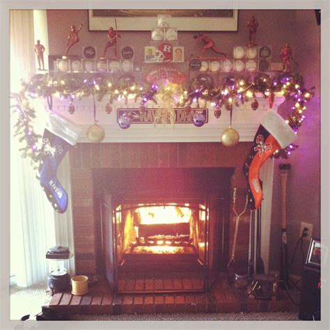 Christmas mantle decorated with your favorite sports team's colors | Christmas mantle, Mantle ...