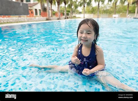 Asian Little Baby Girl In Swimming Pool Stock Photo Alamy