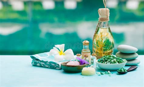Spa And Wellness Massage Setting Still Life With Essential Oil Salt And Stones Outdoor