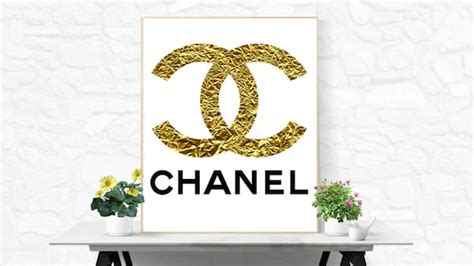 Gold Chanel Drip Logo