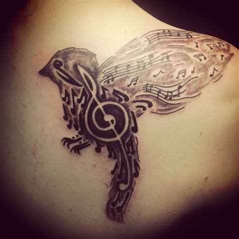 172 stunning cancer ribbon tattoos. Pretty music bird tattoo | Music bird tattoos, Tattoo ...