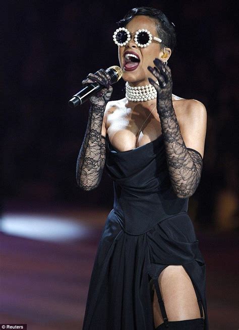 She S No Angel Rihanna Raunches It Up In Slit To The Thigh Corset Dr