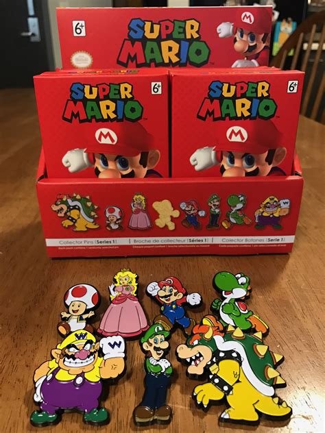 super mario collector pins nintendo · conspire prints · online store powered by storenvy