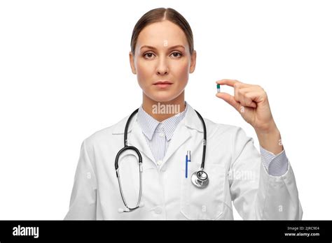 Female Doctor Holding Medicine Pill Stock Photo Alamy