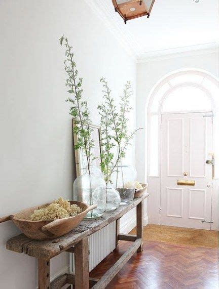 Foyer In A Uk Country House With Reclaimed Wood Table Gray Walls And