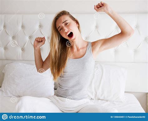 Woman Stretching In Bed After Wake Up Front View Stock Image Image Of Lethargic Front 135043451