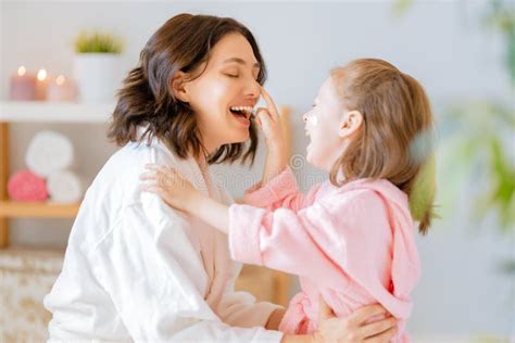 Mother And Daughter Caring For Skin Stock Photo Image Of Hygiene