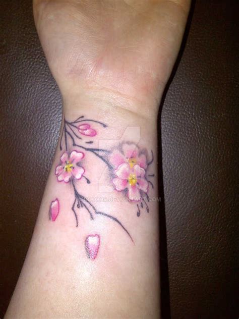 27 Glorious Wrist Flower Tattoos And Designs