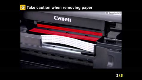 Slowly pull out the paper with both hands so the paper doesn't tear. PIXMA MG6620: Removing a jammed paper: inside the printer ...