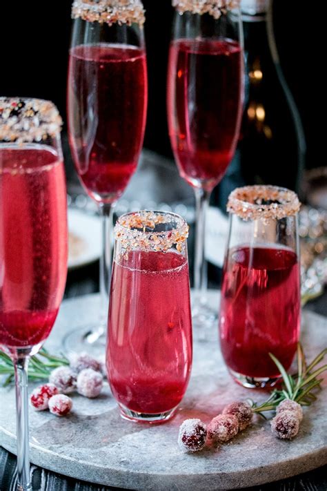 Christmas time means indulging yourself a little more than usual, and it's certainly not too early to start planning your the classic cocktail will work for your champagne breakfast on the big day, an accompaniment to a dinner party menu, or just served alone at a drinks. Cranberry Ginger Sparkling Holiday Cocktail ~ Cooks With ...