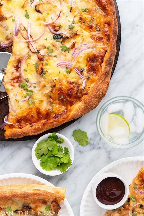 A Pizza Sitting On Top Of A Pan Covered In Cheese And Veggie Toppings