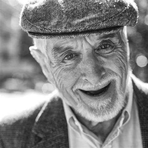 headshot of smiling old man in black and white man photography black and white makeup headshots