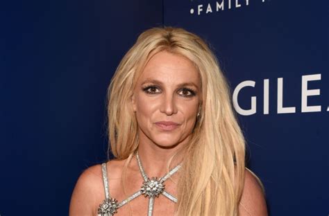 Britney Spears Stuns Unbuttoned In Her Backyard