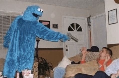 Cookie Monster Pointing Gun At Man Cookie Monster Pointing Guns Man