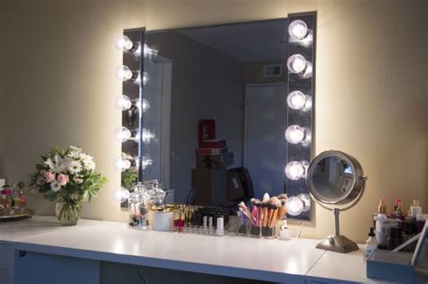 The great thing about fairy lights is that they can be used to decorate inside or outside, as this diy proves. Glam! DIY Lighted Vanity Mirrors | Decorating Your Small Space