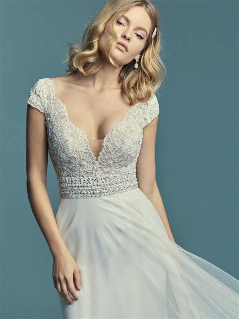 Monarch Delicate Lace Motifs Accent The Bodice In This Boho Wedding