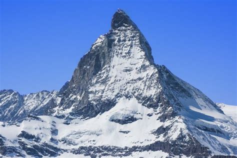 Snowy Matterhorn Peak In Sunny Day With Blue Sky Switzerland Stock