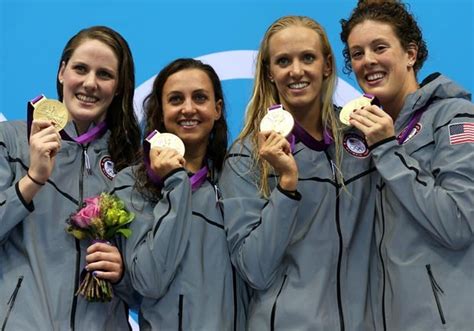 u s women set world record to win gold medal in 4x100 meter medley relay cbs news