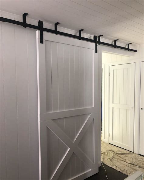 Rebarn custom built these massive doors, and custom fabricated this set of ceiling mounted full bypass hardware, and did the install on this impressive. 𝓐𝓷𝓰𝓮𝓵𝓪 on Instagram: "Spring Hill project - downstairs ...