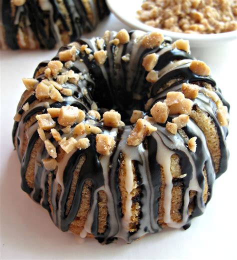 These mini bundt cake recipes will truly rock your world! Vanilla Bean Mini-Bundt Cakes with Chocolate-Toffee Crunch - The Monday Box