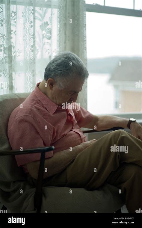 Old Man Sleeping In Living Room Chair Stock Photo Alamy