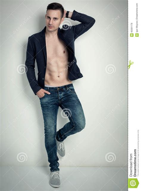 Fashion Portrait Of A Hot Male Model In Stylish Jeans