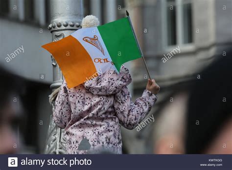 An Irish Flag Is Held Aloft During The 1916 Easter Rising Celebrations