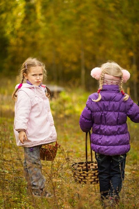 Cute Little Girls In The Autumn Forest Stock Photo Image Of