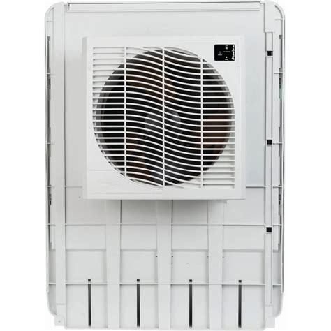 An Air Conditioner Mounted On The Side Of A Wall With A Ventilator