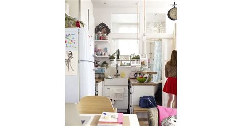 Open Shelving And A Two Tier Countertop Create Space In The Tiny Tiny