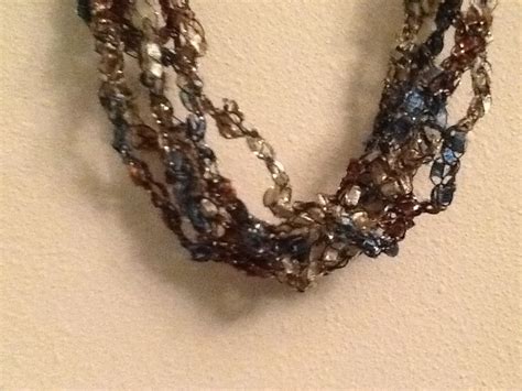 Flowers by debbie hogansville ga. Close up of Brown and blue necklace. These will be on sale ...