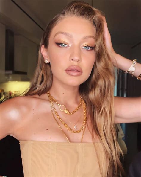 Gigi Hadid Shows Off Her Growing Baby Bump For The First Time As Her