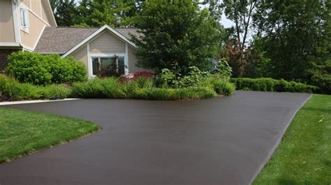 13)it doesn't cost much to stay at that hotel. How Much Does It Cost to Install an Asphalt Driveway? | Asphalt driveway, Modern driveway ...