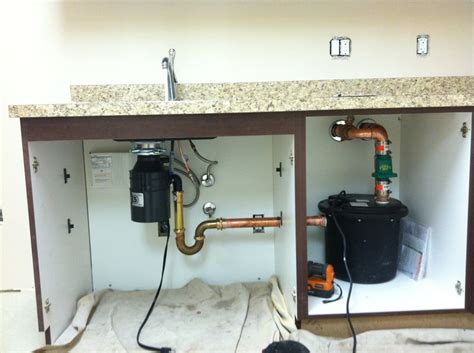 Easy to use, easy to maintain: Under sink discharge pump system when a drain is not ...